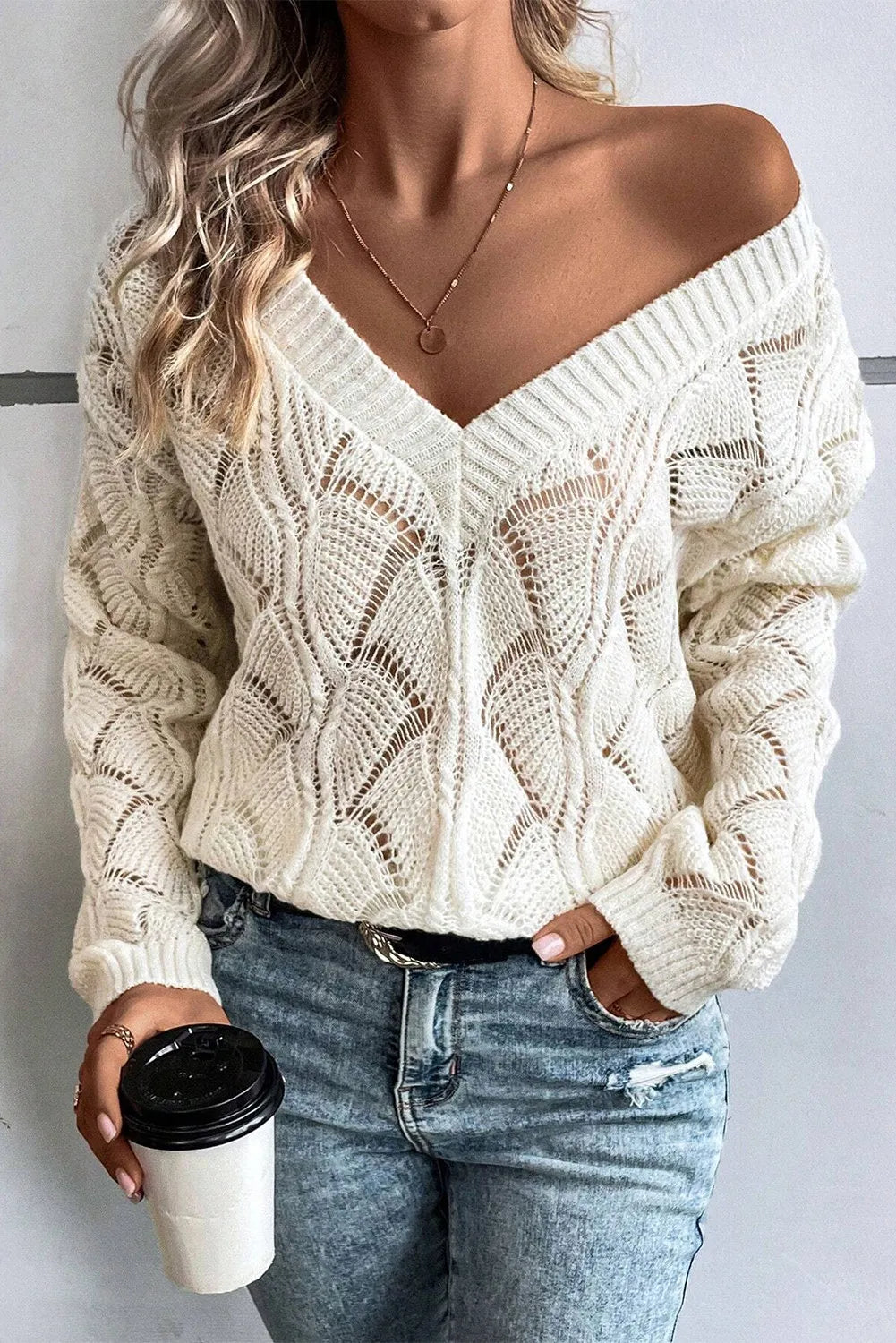 Title: Openwork V-Neck Long Sleeve Sweater – Cozy with a Delicate Touch