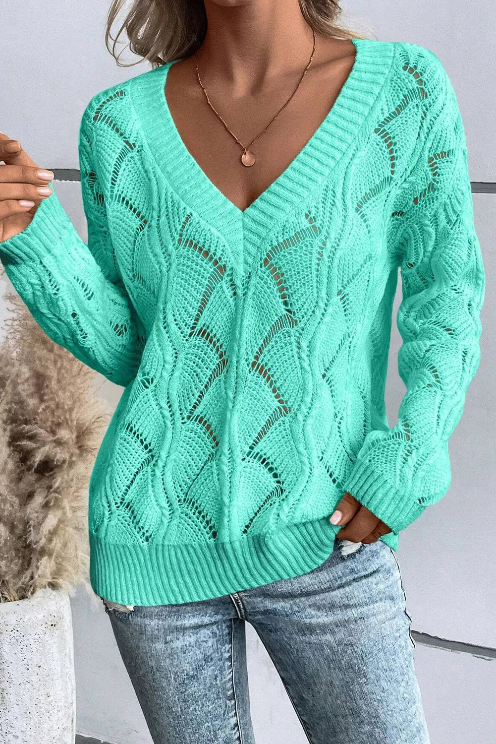 Title: Openwork V-Neck Long Sleeve Sweater – Cozy with a Delicate Touch