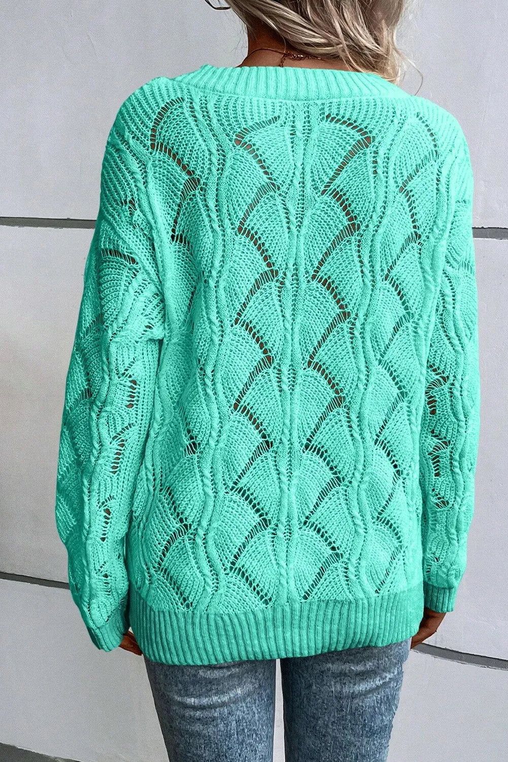 Title: Openwork V-Neck Long Sleeve Sweater – Cozy with a Delicate Touch