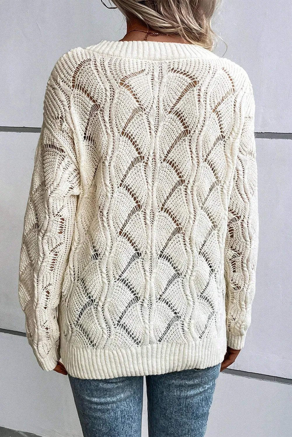 Title: Openwork V-Neck Long Sleeve Sweater – Cozy with a Delicate Touch