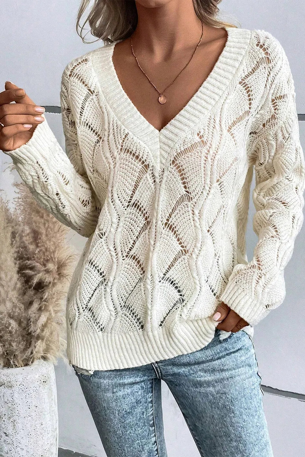 Title: Openwork V-Neck Long Sleeve Sweater – Cozy with a Delicate Touch