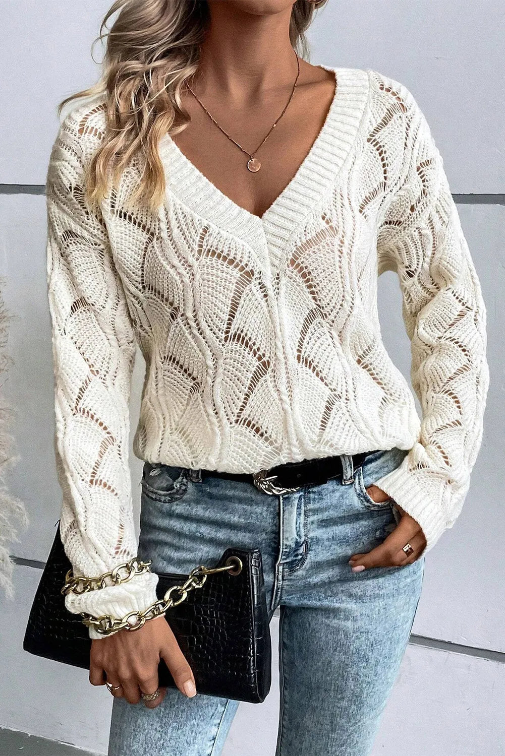 Title: Openwork V-Neck Long Sleeve Sweater – Cozy with a Delicate Touch